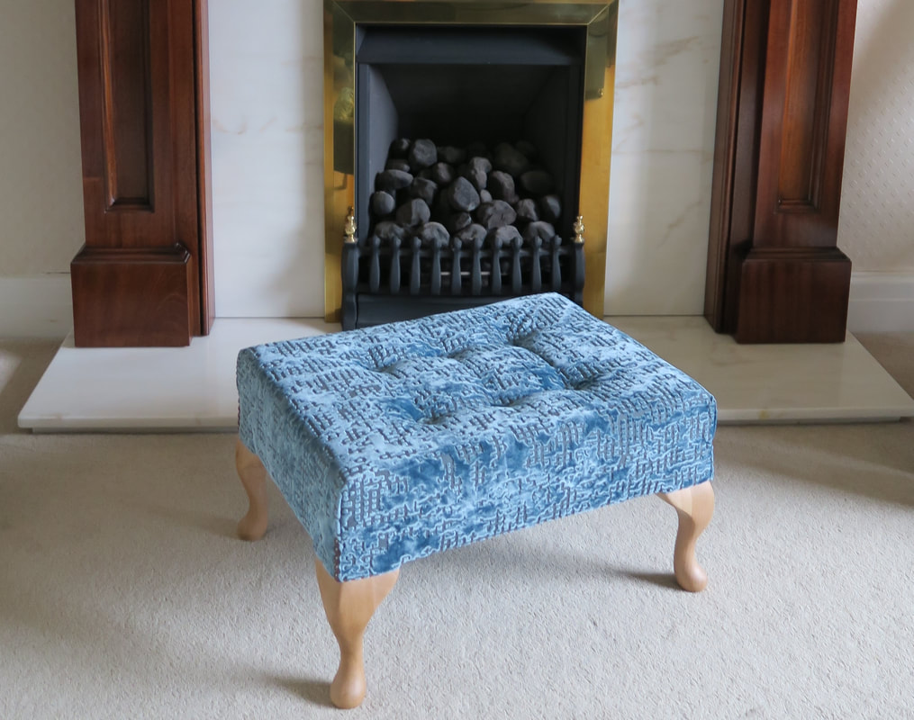 Small blue, silver, grey velvet footstool, Fiona, by the fire