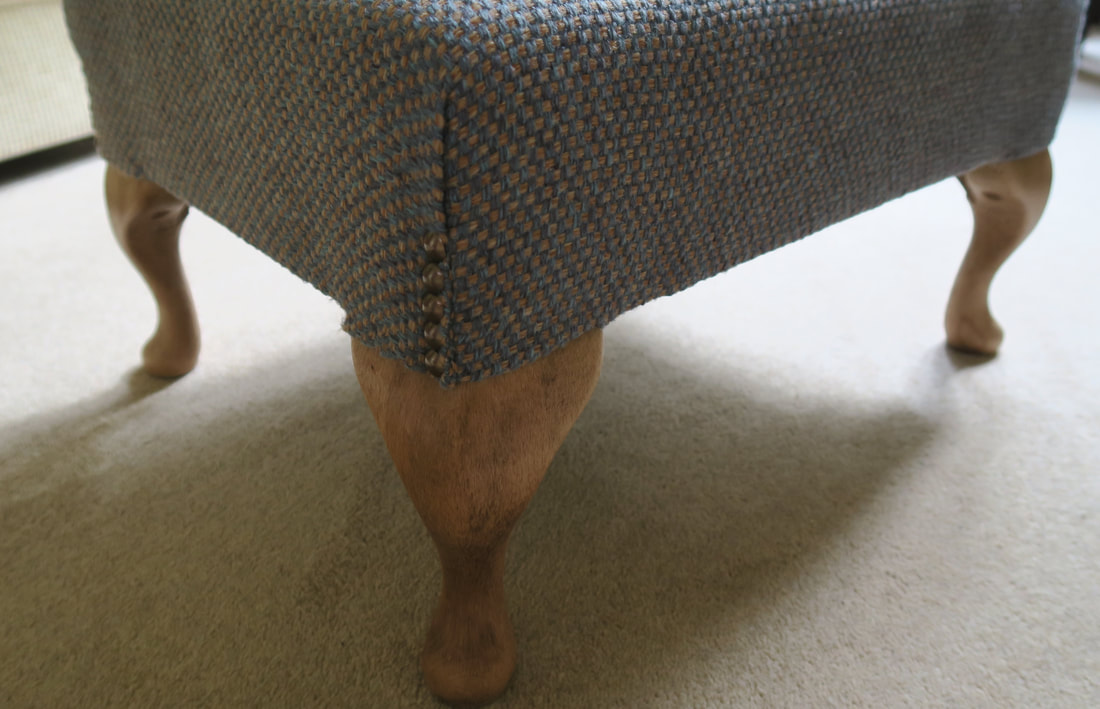 Freda, small footstool - detail of the legs & decorative studs on each corner.