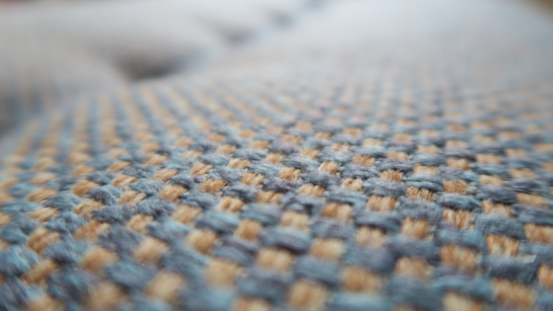 Close up on the textured fabric used on Freda, the small footstool