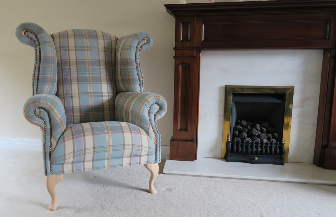 Wingback armchair, Wilma, by the fire